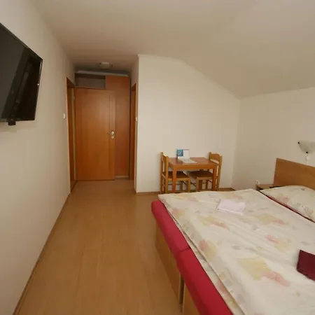 Quarto em Acomodações Particulares Ema